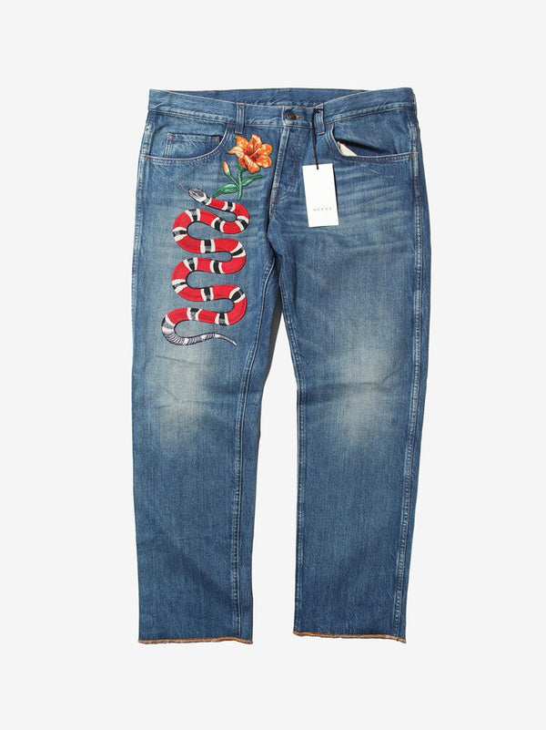 GUCCI EMBROIDERED SNAKE DENIM JEANS